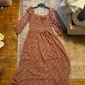 Midi length, mode code size medium floral dress with slit